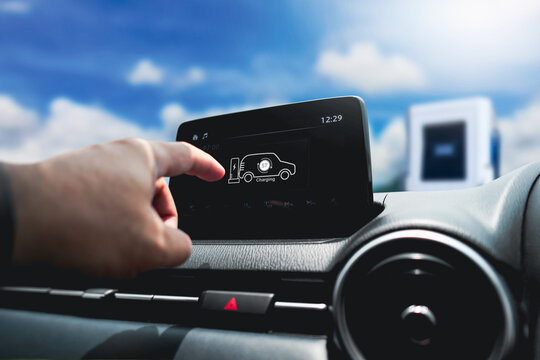 Charging electric car battery , Battery charging icon displayed on the vehicle screen Electric vehicle battery technology concept