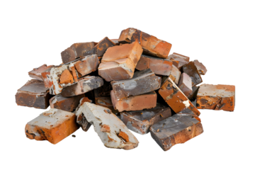 Stack of old and broken bricks pile isolated on a transparent background.