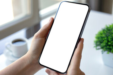 male hand hold phone isolated screen background coffee in office