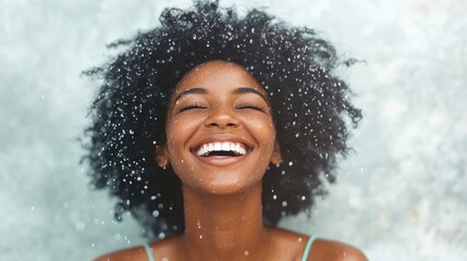 Fototapeta premium A woman revels in a natural rain shower, her laughter and radiant smile reflecting the joy of the moment in a sunny outdoor setting