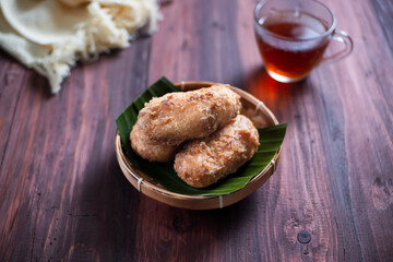 Kue Gemblong, Getas, Kemplang, Indonesian Traditional Snack made from Sticky Rice Coated with Sugar. Perfect for recipe, article, catalogue, commercial, or any cooking content.