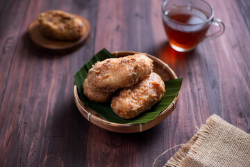 Kue Gemblong, Getas, Kemplang, Indonesian Traditional Snack made from Sticky Rice Coated with Sugar. Perfect for recipe, article, catalogue, commercial, or any cooking content.