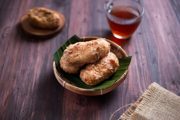 Kue Gemblong, Getas, Kemplang, Indonesian Traditional Snack made from Sticky Rice Coated with Sugar. Perfect for recipe, article, catalogue, commercial, or any cooking content.