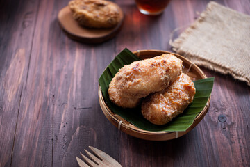 Kue Gemblong, Getas, Kemplang, Indonesian Traditional Snack made from Sticky Rice Coated with Sugar. Perfect for recipe, article, catalogue, commercial, or any cooking content.