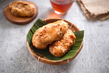Kue Gemblong, Getas, Kemplang, Indonesian Traditional Snack made from Sticky Rice Coated with Sugar. Perfect for recipe, article, catalogue, commercial, or any cooking content.