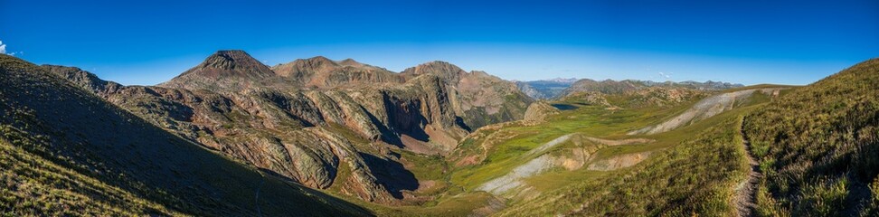 Fototapeta premium Mountain tundra valley with tall cliffs