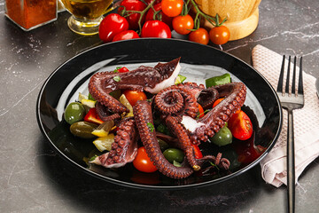 Salad with octopus tentacle and vegetables