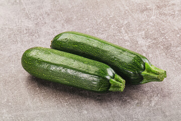 Raw green ripe zucchini vegetable