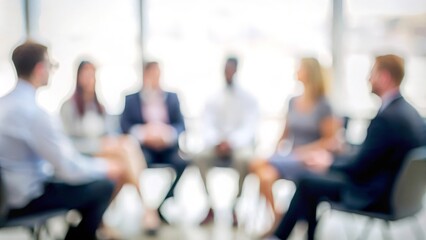 Focused Team Discussion Background - Blurred background of a focused team discussion.
