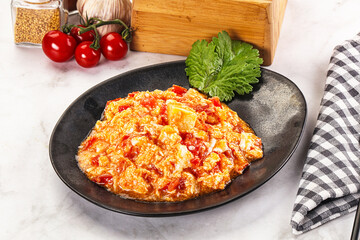 Shakshuka with tomato for breakfast