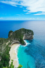 Amazing wild nature landscape view of Azure beach lagoon with rocky mountains and clear water at Nusa Penida, Bali. summer background and summer vacation concept. © Balnyes Visuals