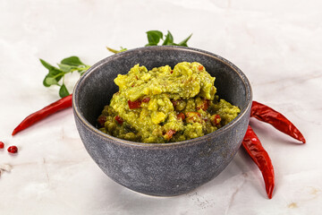 Guacamole with avocado, tomato and chili