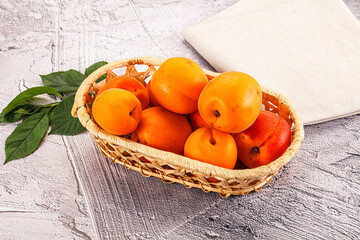 Raw ripe sweet apricots heap