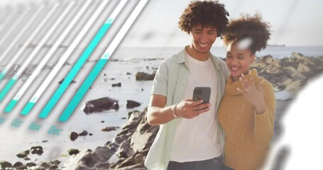Animation of data processing over african american couple using smartphone on beach - Powered by Adobe