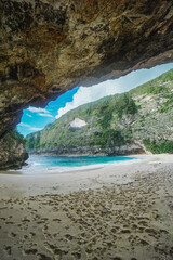 A secluded tropical beach with clear waters and a dreamy summer vibe. © Balnyes Visuals