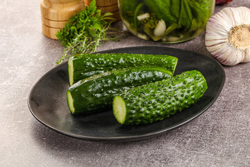 Homemade lighty salted cucumbers with herbs