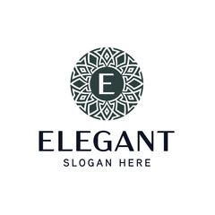 Fototapeta premium Ornamental Monogram Logo for Artistic and Refined Brands