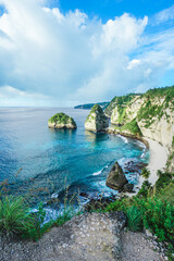 Beautiful Diamond Beach at Nusa Penida, Bali, Indonesia. Delightful seascape, waves, blue sea and rocks. © Balnyes Visuals