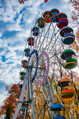 Ferris wheel amuse entertainment and sightseeing in autumn or fall season park outdoor