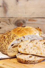 Homemade bread, sourdough wheat loaf with seeds