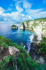 beautiful scenery of Diamond Beach of Nusa Penida island with blue sky during day time. summer background and summer vacation concept. © Balnyes Visuals