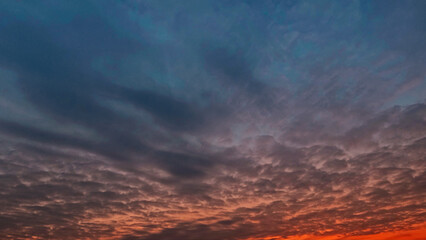 Fototapeta premium beautiful sunset goldish clouds on the sky backdrop - photo of nature