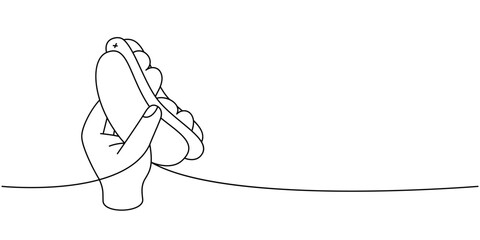 Hand hold hotdog one line continuous drawing. American street fast food. Vector linear illustration.