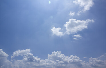 
Blue sky with puffy clouds