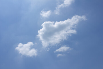 
Blue sky with puffy clouds