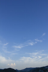 
It's a sunset sky with feathery clouds.