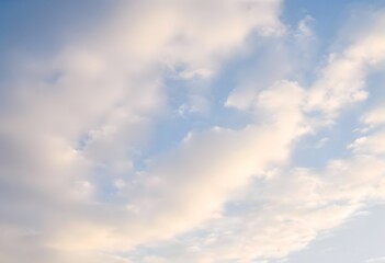 Fototapeta premium Summer day with a bright blue sky and scattered white clouds