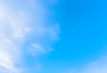  Clear blue sky with fluffy white clouds drifting slowly