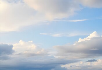 Obraz premium Clear blue sky with fluffy white clouds drifting slowly