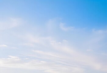 Obraz premium Fluffy Clouds Against a Blue Sky