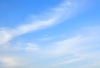 Fototapeta premium Fluffy Clouds Against a Blue Sky