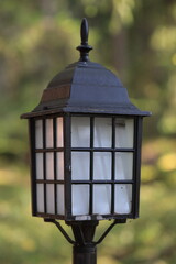 A clear view of a street light with a blurred background, great for urban or cityscape illustrations.