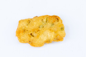 Bakwan is an Indonesian-style vegetable fritter made from a mixture of flour and assorted vegetables like carrots, cabbage, and bean sprouts.