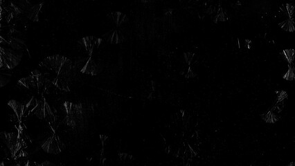 Frosted glass texture from freezing, displaying delicate ice flowers patterns and translucent cold...