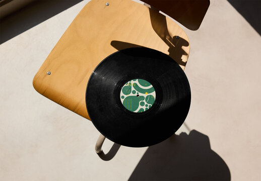 Mockup Of Lp Vinyl Record Wit Customizable Label On Chair