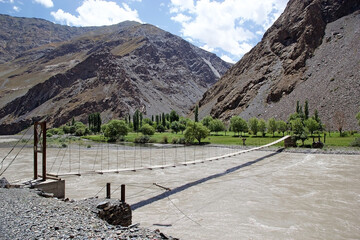 Tibetan bridge along the Bartang River in the Gorno-Badakhshan region in Tajikistan