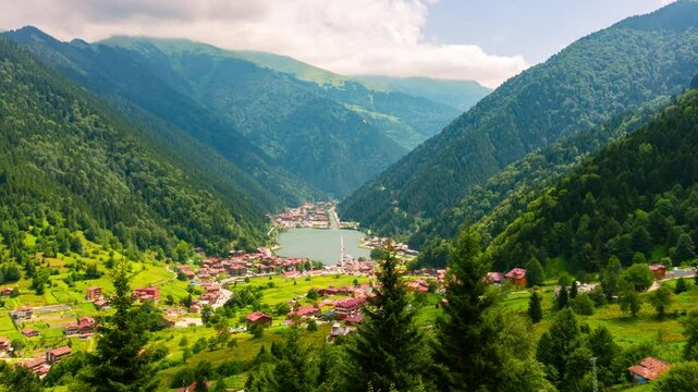 Uzungol time lapse 4k footage with motion of the clouds. Visit Trabzon Uzungol 4k background video.