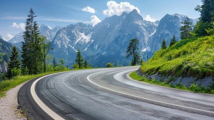 Naklejka premium Curved asphalt road in Austria with breathtaking mountain views
