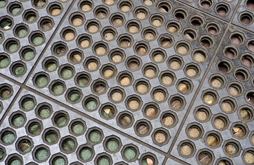 Anti slip rubber floor mat with round holes pattern isolated on horizontal ratio background.