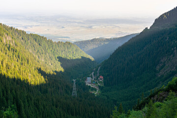 view in to the distant rural valley. mountainous countryside landscape. forested hills. beautiful...