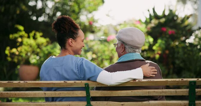 Back, bench and senior woman with caregiver outdoor in retirement community with daily assistance and support. Elderly person, nurse and relax with conversation and wellness by residential care home.