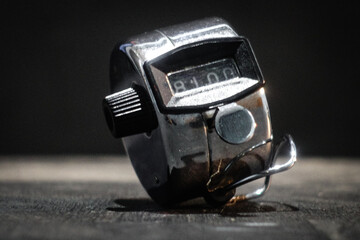 closeup picture of hand tally counter