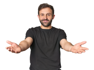 Studio portrait of young Hispanic male showing a welcome expression.