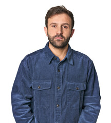 Studio portrait of young Hispanic male sad, serious face, feeling miserable and displeased.