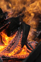 Fototapeta premium photo of a hearth from a pile of wood.