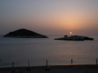 Beautiful sunrise over the Adriatic Sea and Campi island. Baia and Cala Campi, Vieste, Gargano...